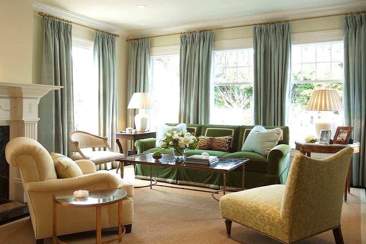 Sử dụng mẫu rèm đơn giản màu xanh ngọc để bố trí cho phòng khách