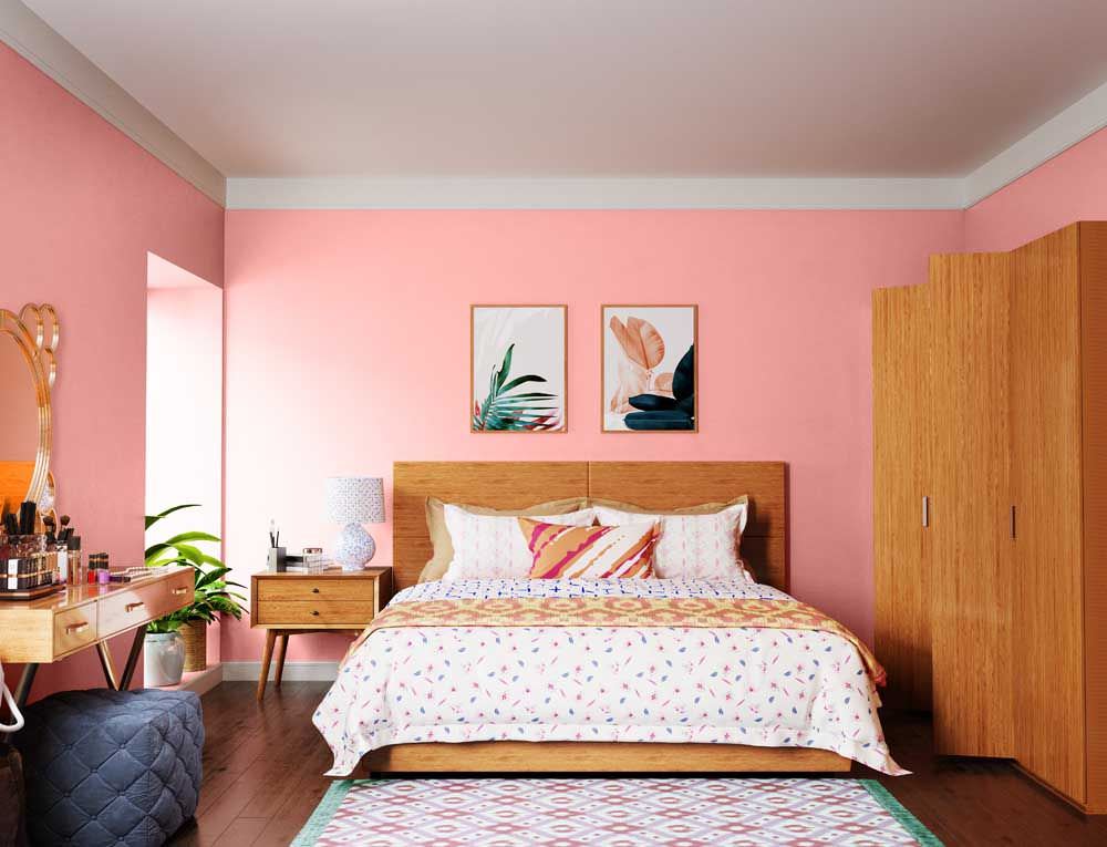 Màu hồng phấn nhẹ nhàng kết hợp nội thất màu gỗ là lựa chọn tuyệt vời cho người mệnh Hoả