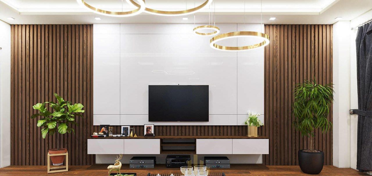 Phòng khách ốp gỗ tại vách tường tivi bằng thanh lam làm tăng sự nổi bật và sang trọng hơn