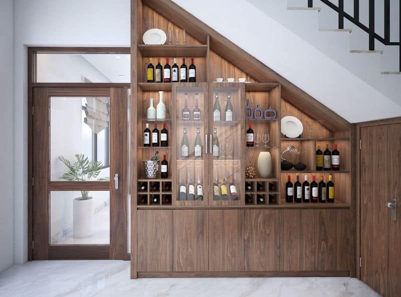 Tủ rượu âm tường gỗ đẹp tận dụng gầm cầu thang độc đáo làm tăng thẩm mỹ cho căn phòng khách