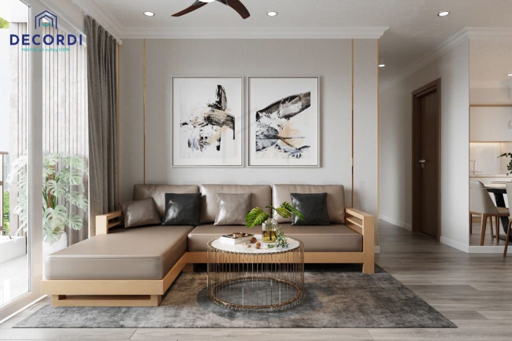 Thiết kế phòng khách rộng rãi với sofa gỗ công nghiệp với đệm da tạo sự êm ái, kết hợp với bàn trà tròn tạo sự hài hòa cho gian phòng khách